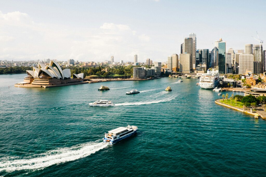 Sydney, Australia's largest city, shines with its iconic landmarks like the Sydney Opera House and Harbour Bridge, offering breathtaking views and vibrant cityscapes.